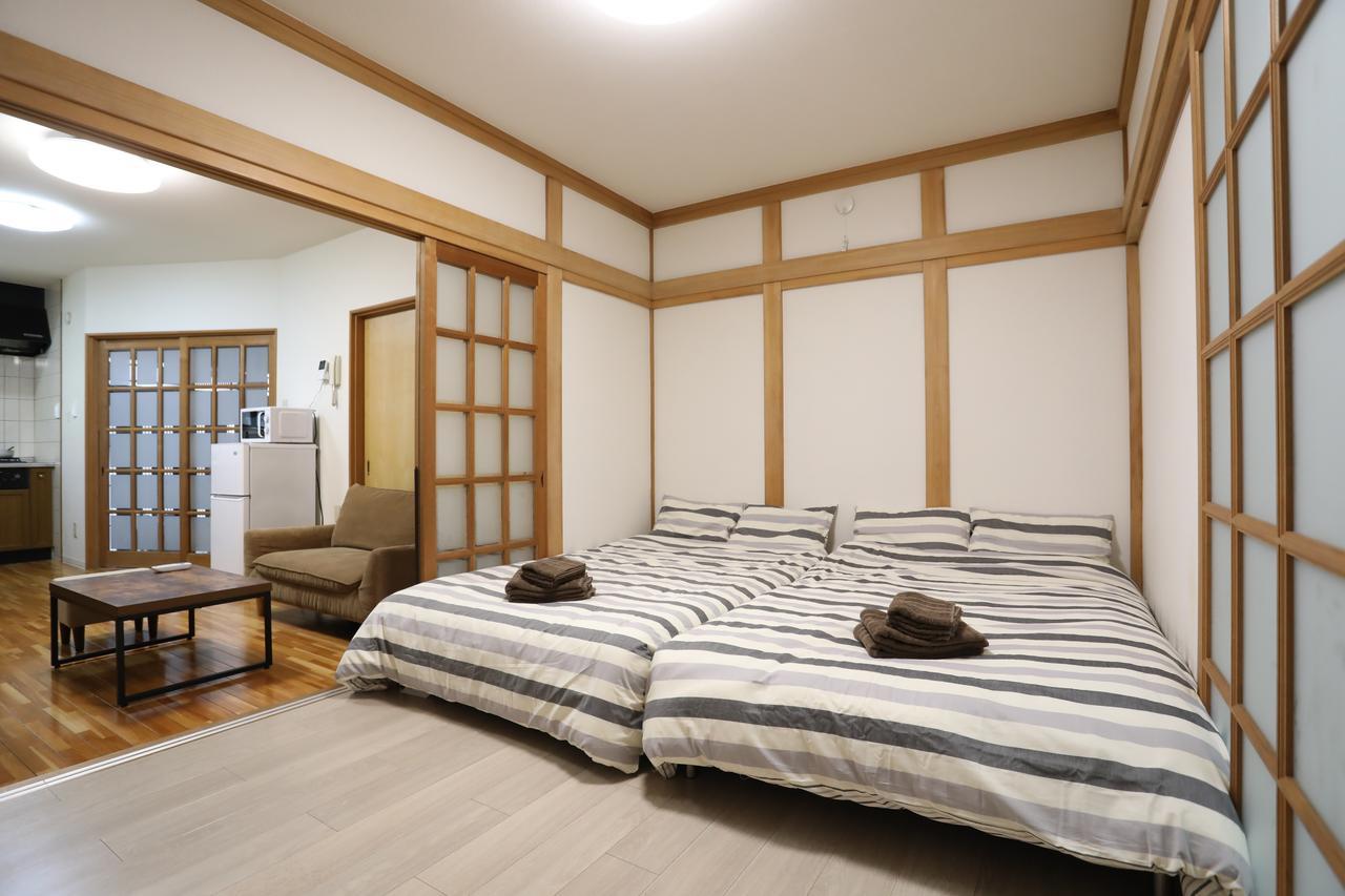 Yamanoyado Tsuru Casa de hóspedes Osaca Exterior foto